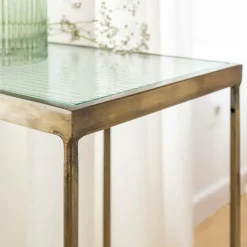 Bout de canapé en métal doré et verre Léa