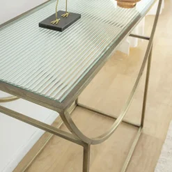 Console en métal doré et verre Léa