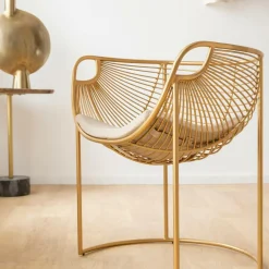 Fauteuil design en métal doré Augustus