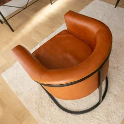 Fauteuil en cuir marron et métal Sacha