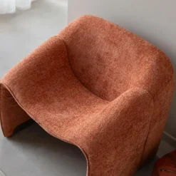 Fauteuil en tissu terracotta Théa
